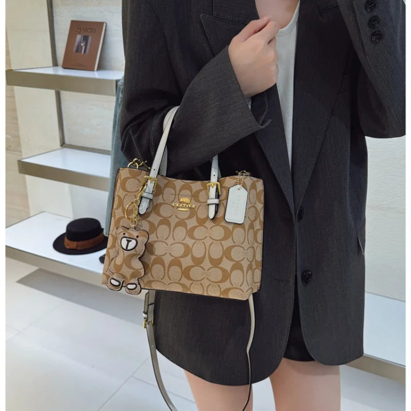 Elegant Monogram Tote Bag in Classic Style for Women Featuring Retro Leather Trim and Detachable Strap