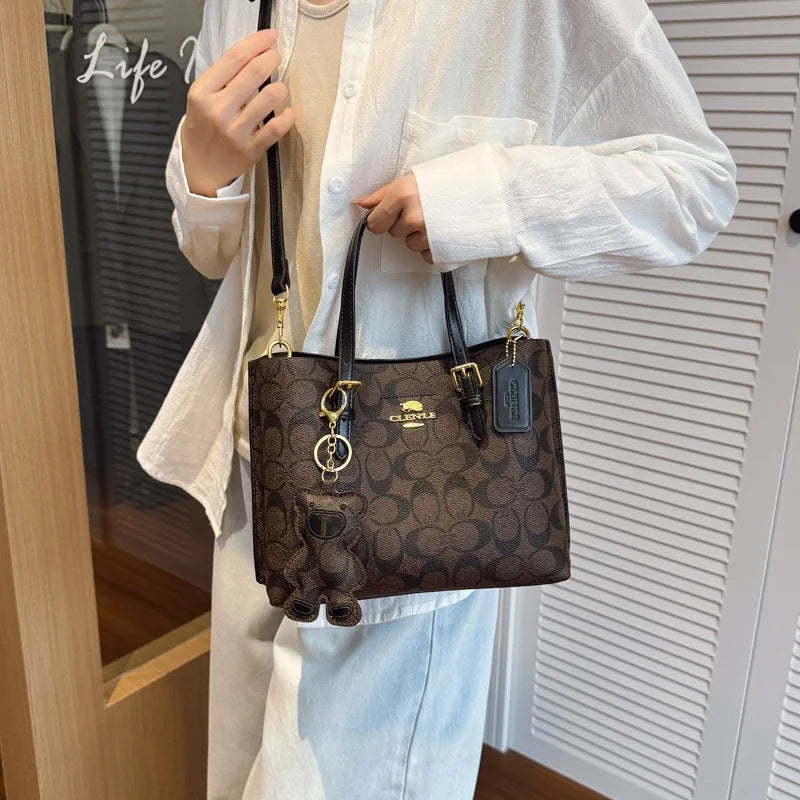 Elegant Monogram Tote Bag in Classic Style for Women Featuring Retro Leather Trim and Detachable Strap