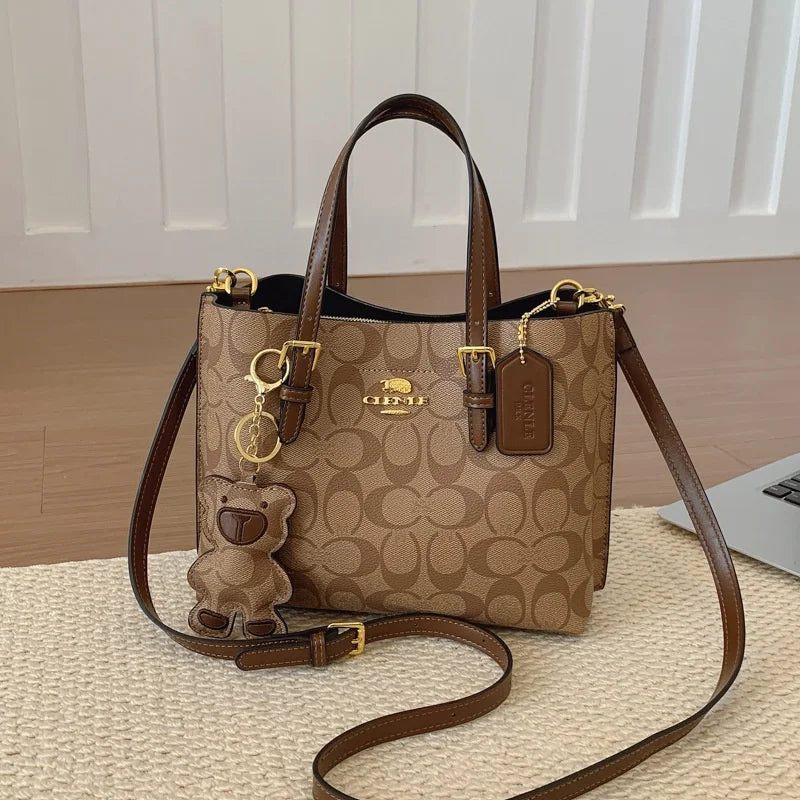 Elegant Monogram Tote Bag in Classic Style for Women Featuring Retro Leather Trim and Detachable Strap