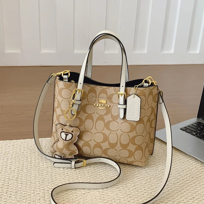 Elegant Monogram Tote Bag in Classic Style for Women Featuring Retro Leather Trim and Detachable Strap
